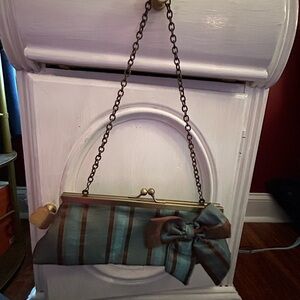 Elegant Striped Clutch with Chain Strap